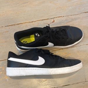 Nike Black Sneakers with White Swoosh and Rubber Sole